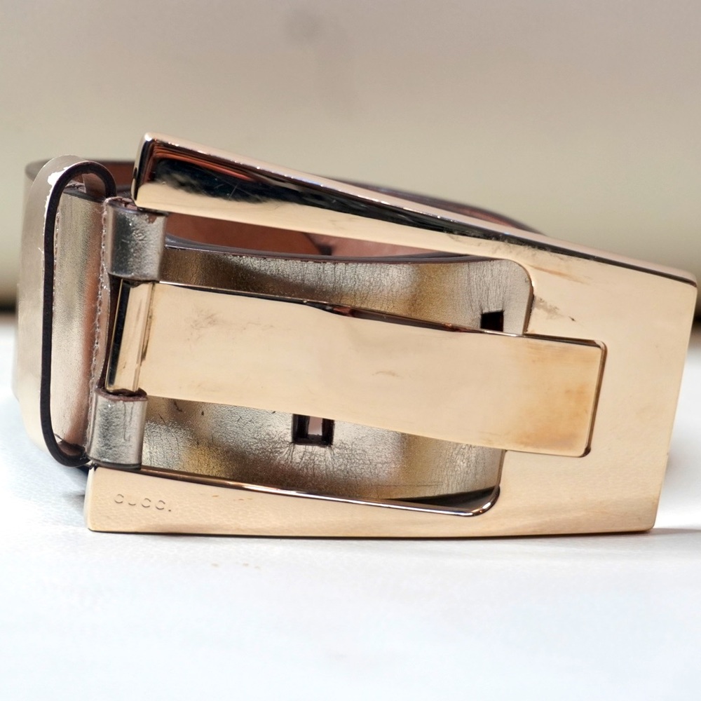 Authentic Gucci Leather Belt in light gold with unique gold buckle